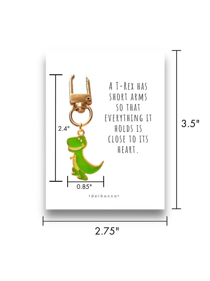 Measurements for T-Rex Dinosaur Mini Keychain Charm Pendant, Bag Charm, Zipper Pull Accessory in green & yellow gold with a saying/verse card that reads: A T-Rex has short arms so that everything it holds is close to its heart.