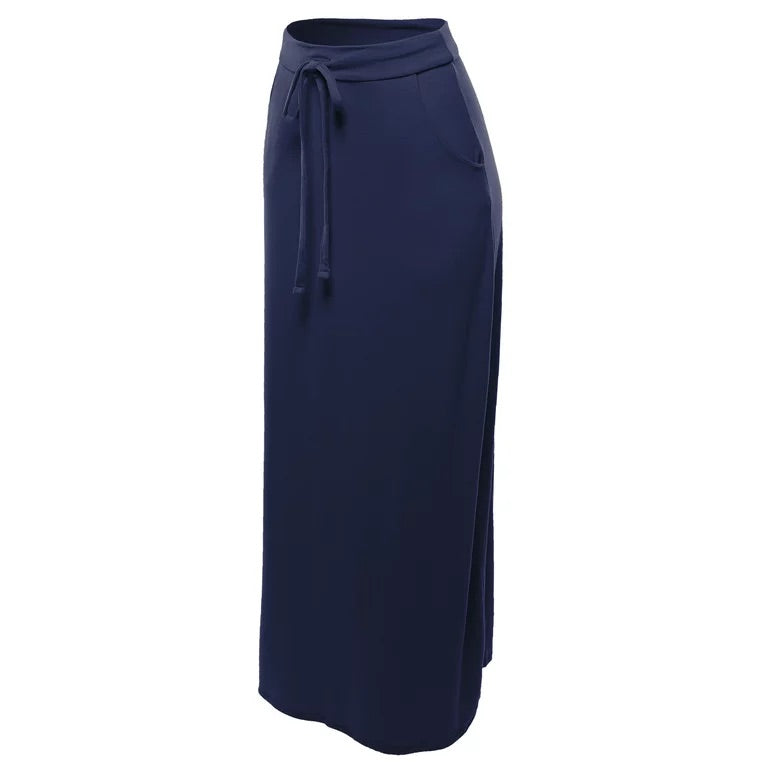 side angled view product photo of a solid navy blue maxi skirt with pockets and an adjustable drawstring waist tie