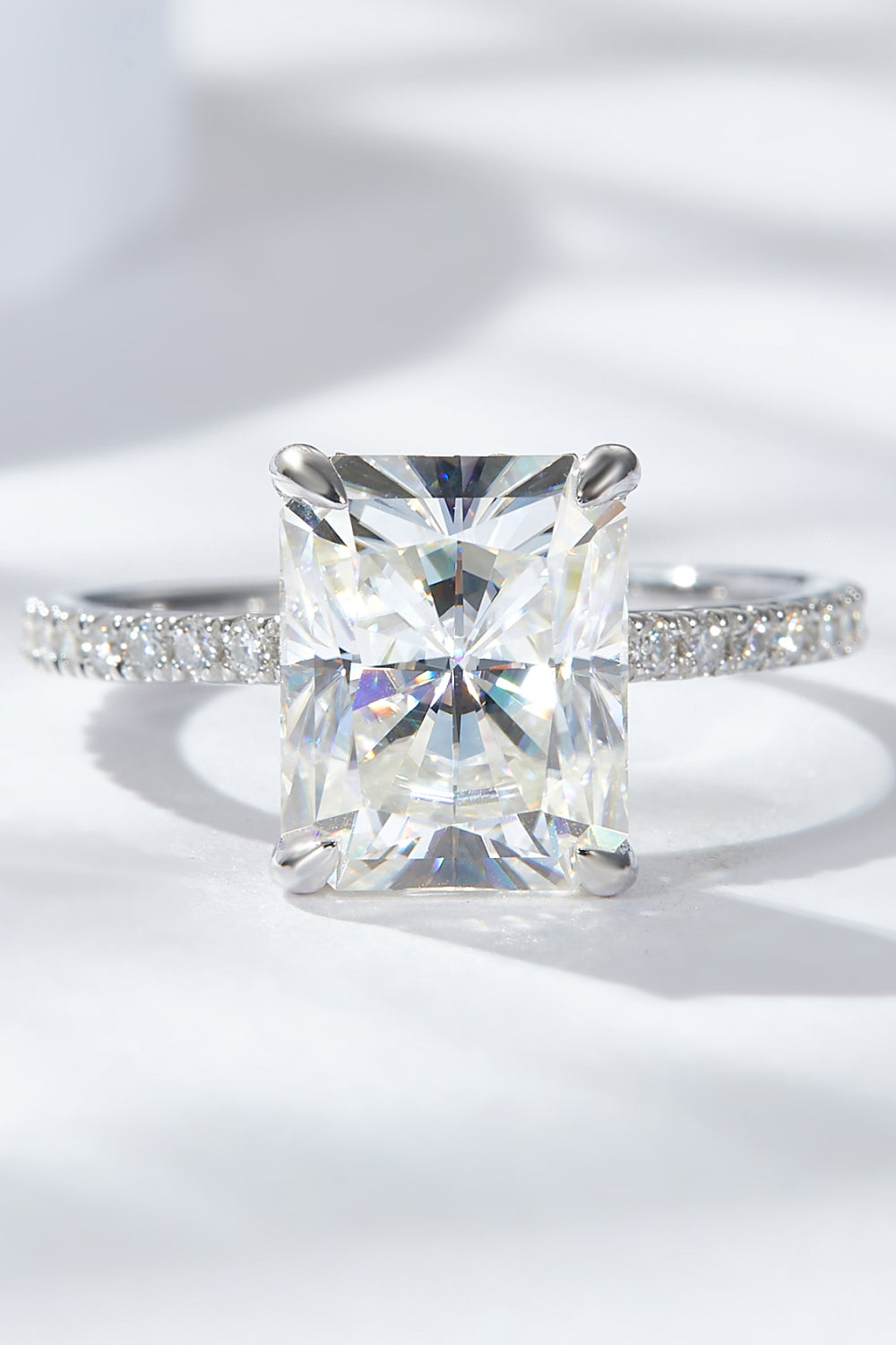 The Audrey - 4 Carat Moissanite 4-Prong Side Stone Ring