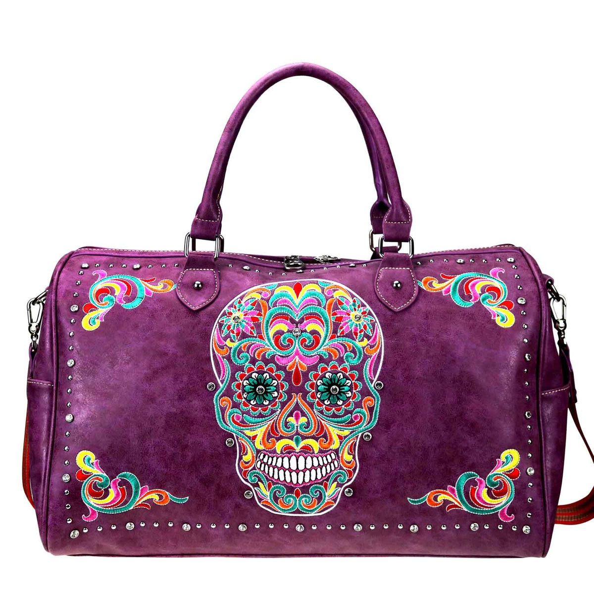 Embroidered Sugar Skull Duffle Bag:  Vibrant embroidered Sugar Skull   Accented with silver and crystal studs Top zippered closure An open pocket on each side with button closure Interior includes a zippered pocket and 2 open pockets  Metal feet on the bottom for protection and stability Detachable/adjustable shoulder strap Double handle 20" x 8" x 12.5" Double Handle Drop 6" Adjustable Strap Drop 18"