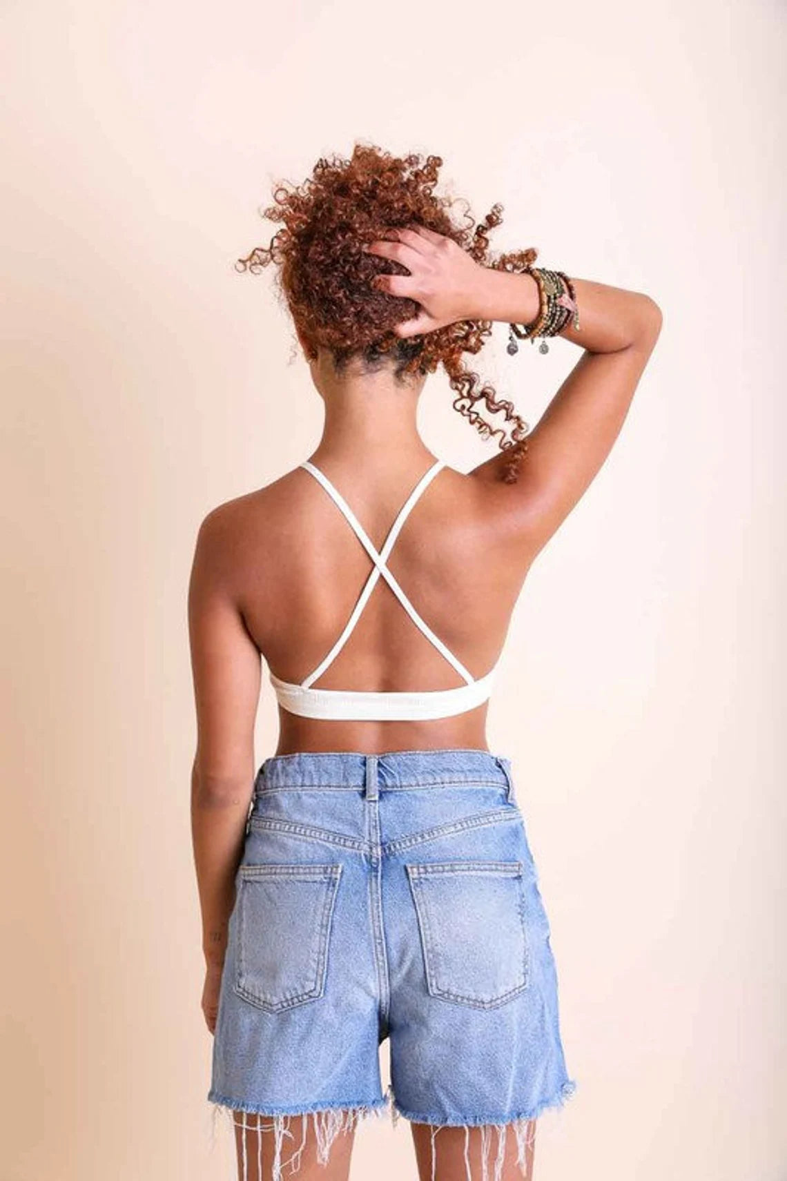 Crochet Lace High Neck Bralette with a boho bohemian vibe and criss cross x back feature. incredibly soft fabric and superior stretch. Available in 2 colors: black or ivory cream white