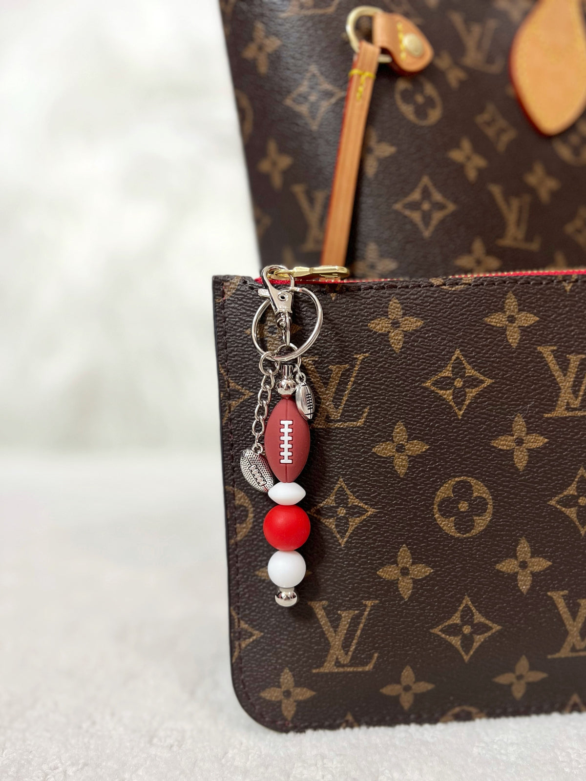 Silicone Football Keychain Purse Charm Zipper Pull with 360 degree swivel lobster clasp, keyring & chain, and bead bar. Personalize Customize with team colors for any football team