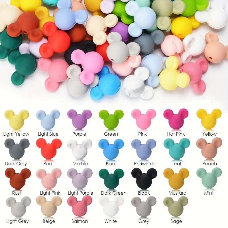 Mickey Mouse Ears Silicone Beads for Handmade Lanyards, Keychains, Wine Bottle Stoppers, Rearview Mirror Car Charm Dangles, and Zipper Pulls in 27 colors including Yellow, Blue, Peach, Green, Grey, Pink, Sage, Teal, Turquoise, Rust, Brick Red, Purple, Black, Beige, Cream, Ivory, White, Mustard, Mint Green, Periwinkle, Lilac