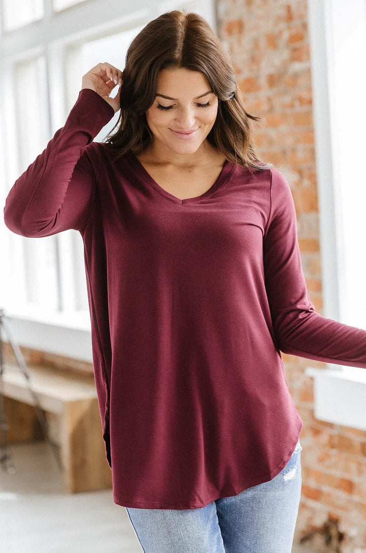 Lynn Relaxed fit long sleeve womens top with a scooped hemline and v-neck available in 9 colors