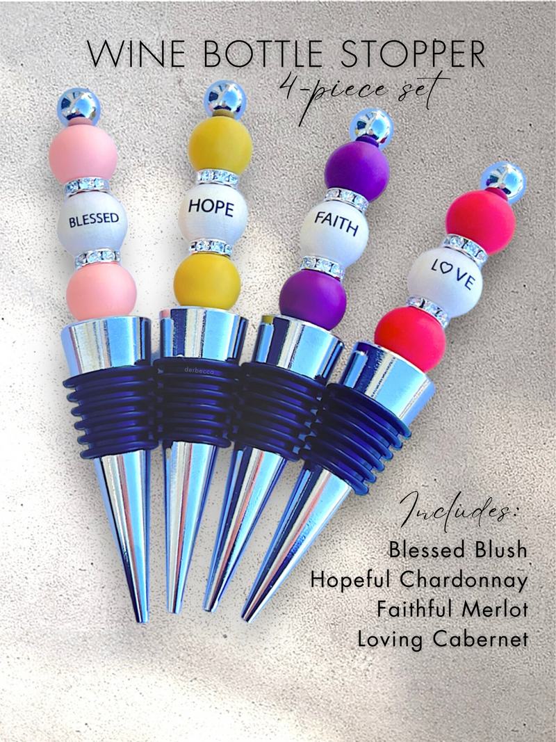 Wine Bottle Stopper 4-piece set made from silicone beads, wood beads, rhinestone spacers including virtues: Blessed, Hope, Faith, and Love. This set is color-coded so each stopper pairs with each type of wine: Blessed is Pink for Blush Wine, Hope is Yellow for Chardonnay, Faith is Purple for Merlot, Love is Red for Cabernet.