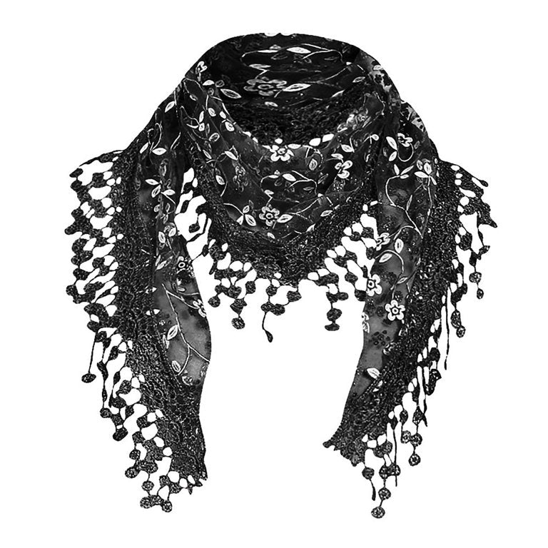 Silver and black embroidered shawl shoulder drape scarf with tassels on a plain background