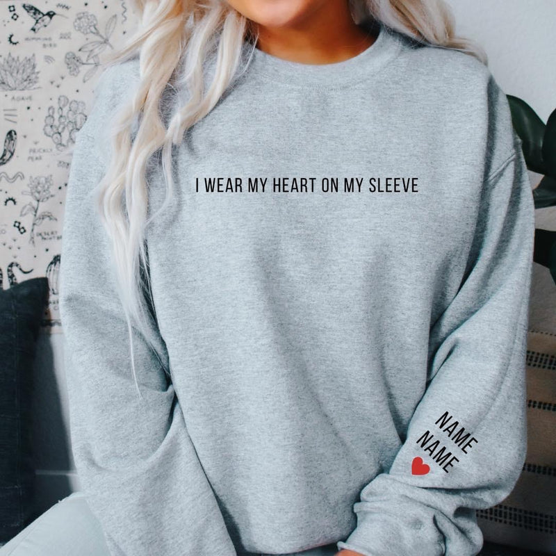 Womens Sweatshirt that reads "I Wear My Heart On My Sleeve" with names of husband & children on sleeve with a heart <3 