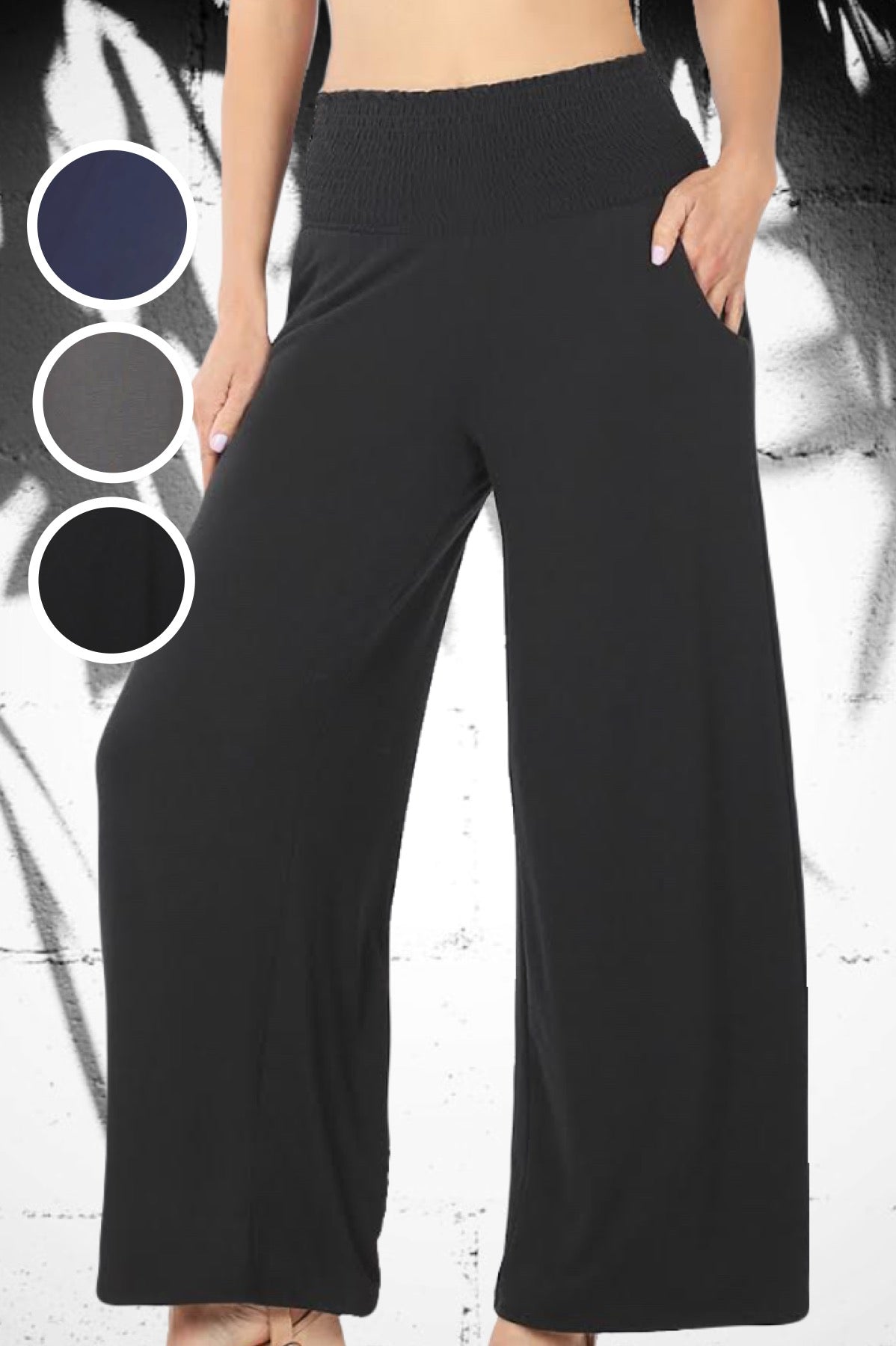 The Jeanette Pants with Pockets feature a comfortable stretch-smocked yoga-style waistband and a relaxed fit through the hip and thigh. These pants transition from loungewear to evening wear effortlessly...fancy them up with heels and your favorite accessories for a comfortable yet polished evening look. 57% polyester | 38% rayon | 5% spandex available in Black, Ash Grey, Navy Blue